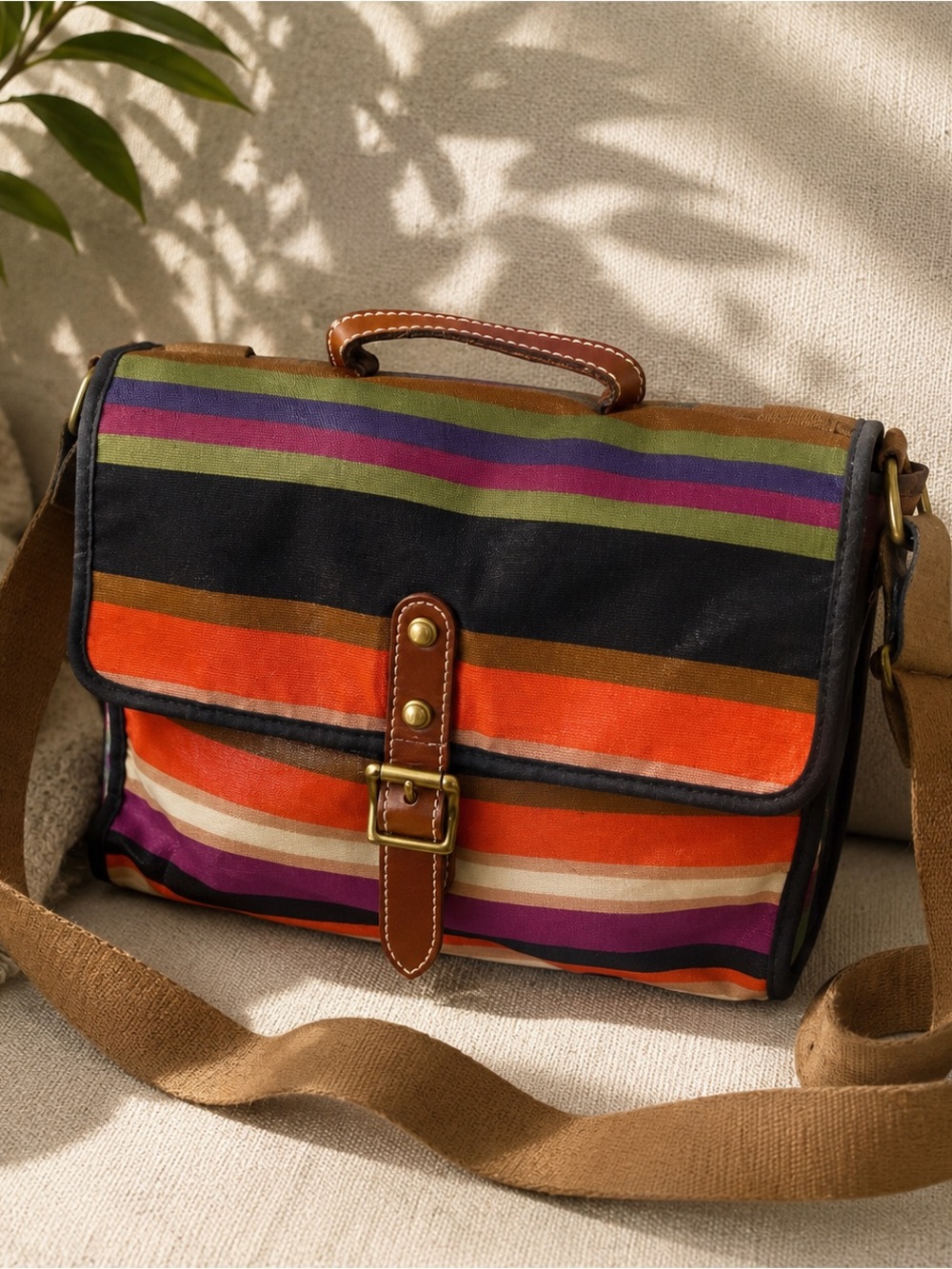 Fossil Key-Per multicolored striped coated canvas crossbody bag .